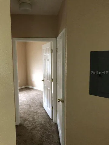 a view of a room with racks on the wall