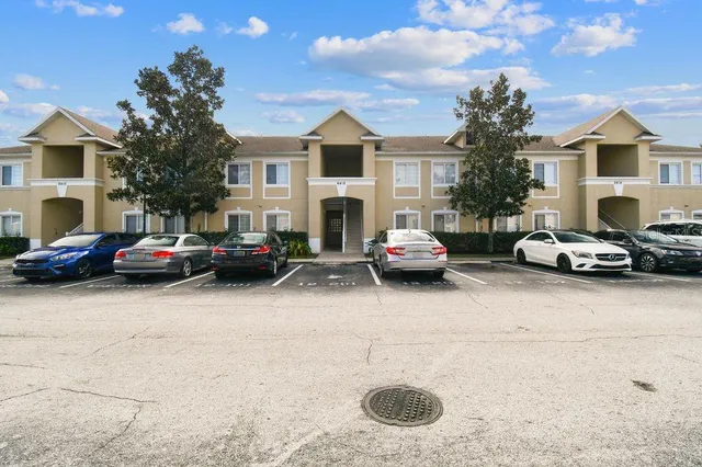 a car parked in front of a house