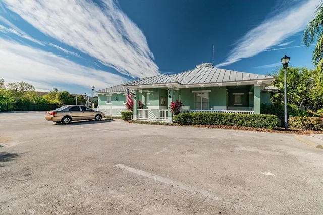 a view of a balcony with wooden floor