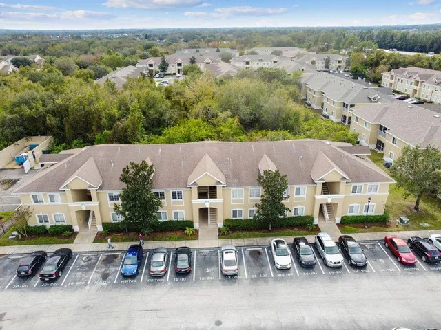 an aerial view of a house with a garden