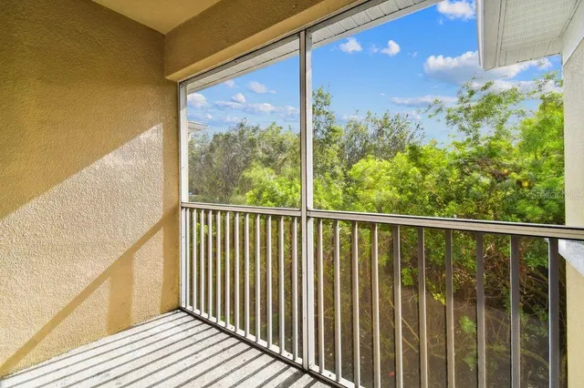 a view of a house with a park