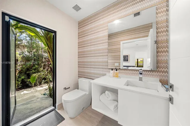 a view of a lake with a city