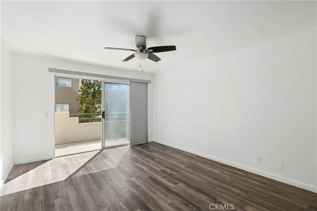 a view of a livingroom with furniture and a fireplace