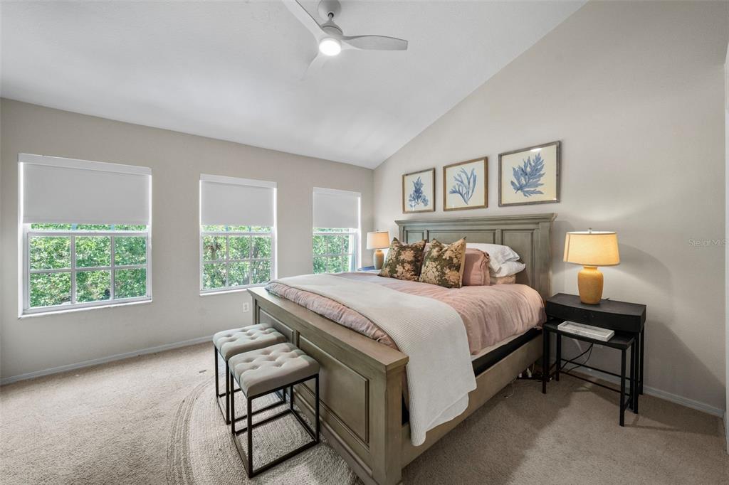1451 Harbour Walk Road Tampa, FL 33602 - Photo 18 of 51 a bedroom with a bed and a lamp next to a window