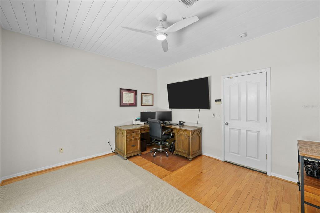 1451 Harbour Walk Road Tampa, FL 33602 - Photo 32 of 51 a view of a livingroom with workspace and a window