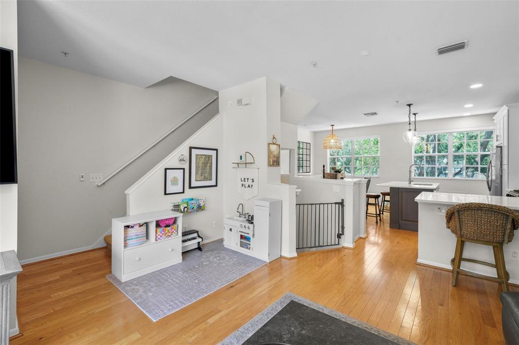 1451 Harbour Walk Road Tampa, FL 33602 - Photo 5 of 51 a living room with furniture and a wooden floor