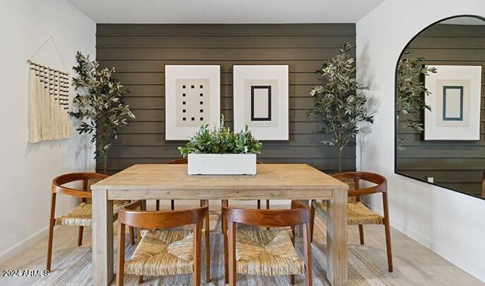 549 West Freedom Street Florence, AZ 85132 - Photo 13 of 26 a view of a dining room with furniture and a potted plant