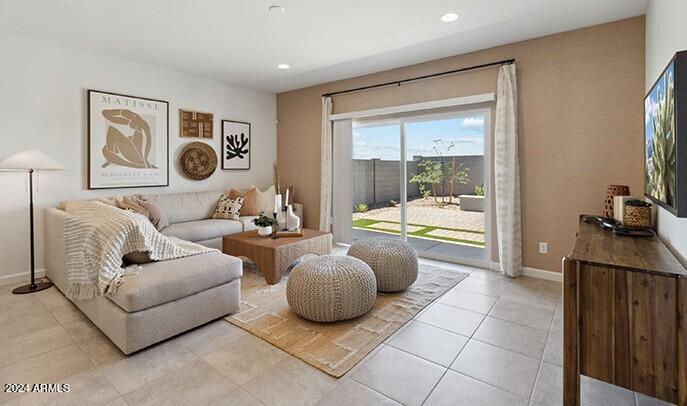 549 West Freedom Street Florence, AZ 85132 - Photo 15 of 26 a living room with furniture and a large window