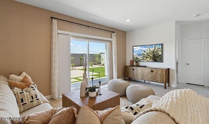 549 West Freedom Street Florence, AZ 85132 - Photo 16 of 26 a bedroom with furniture and a large window