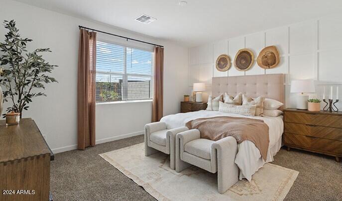549 West Freedom Street Florence, AZ 85132 - Photo 18 of 26 a bedroom with a bed and a window