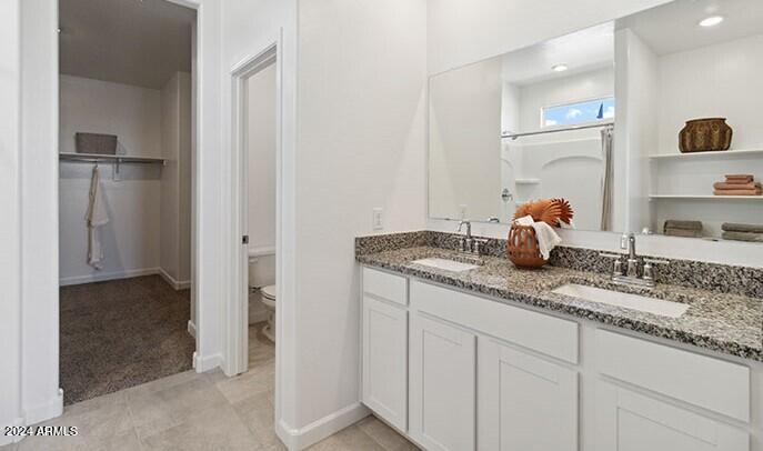 549 West Freedom Street Florence, AZ 85132 - Photo 20 of 26 a kitchen with sink and cabinets