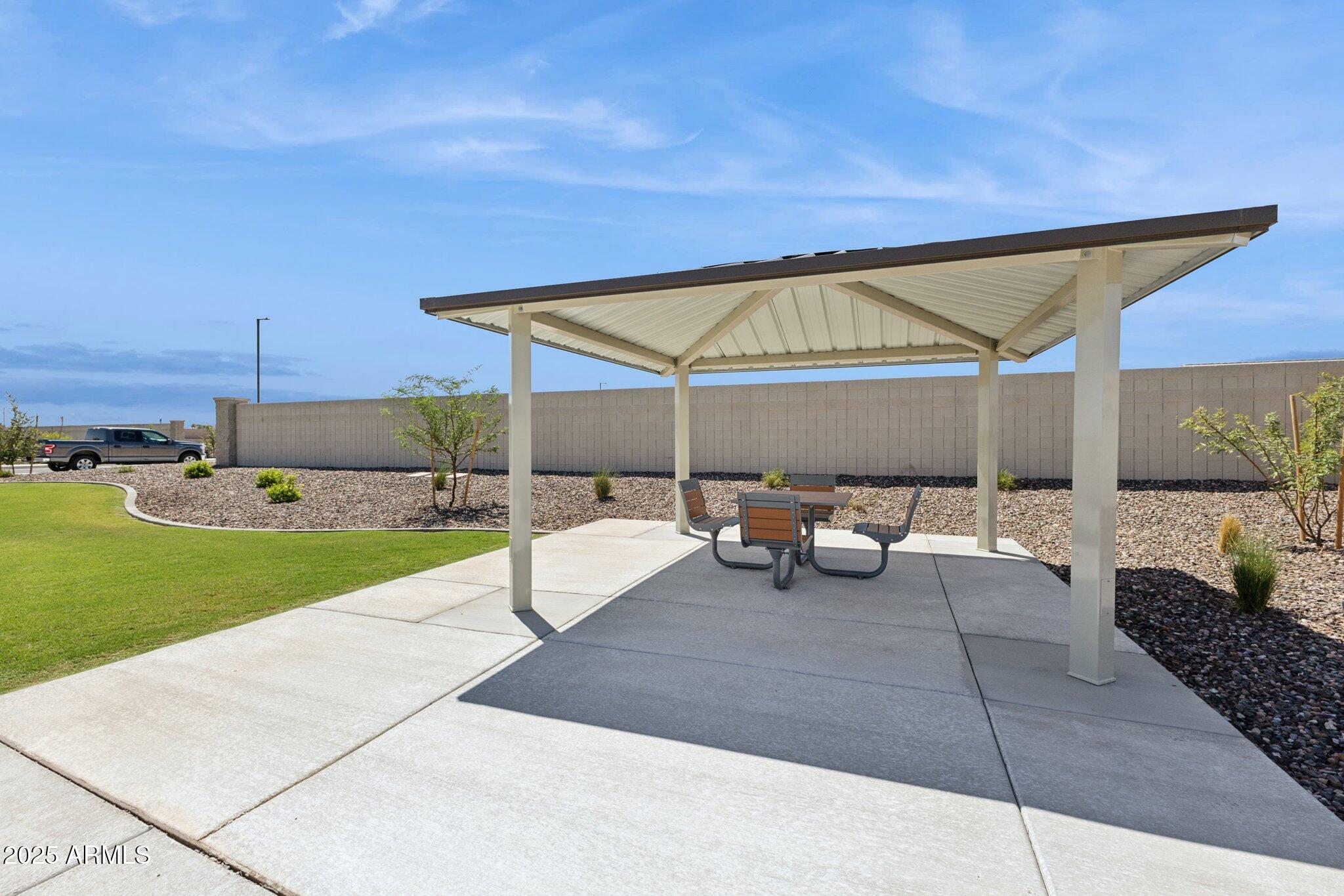 549 West Freedom Street Florence, AZ 85132 - Photo 25 of 26 a view of a backyard with sitting area
