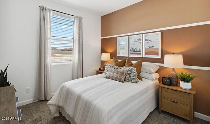 549 West Freedom Street Florence, AZ 85132 - Photo 5 of 26 a bedroom with a bed and window