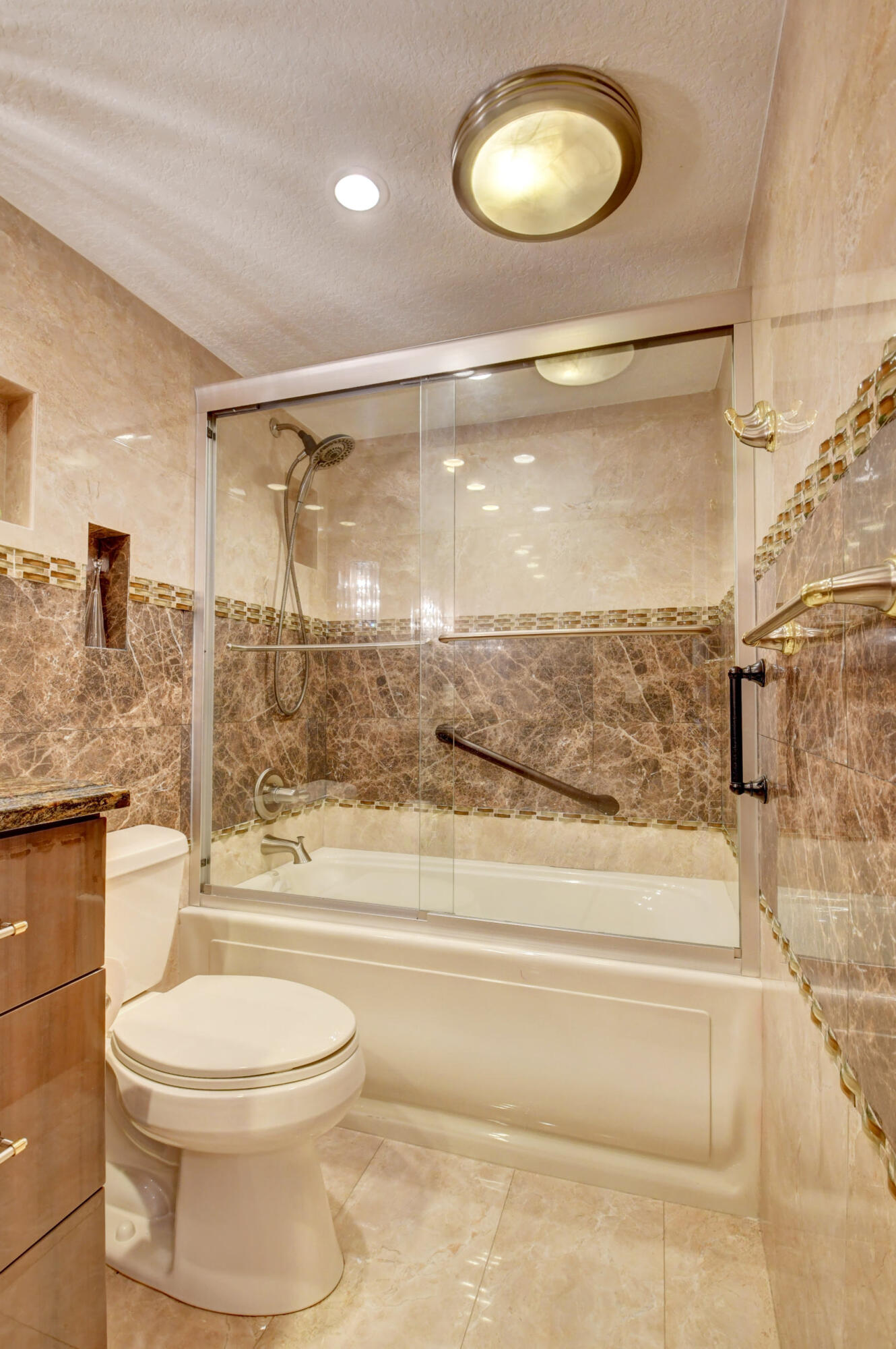 1045 Wolverton C, Unit 1045 Boca Raton, FL 33434 - Photo 17 of 67 a bathroom with a toilet and a shower