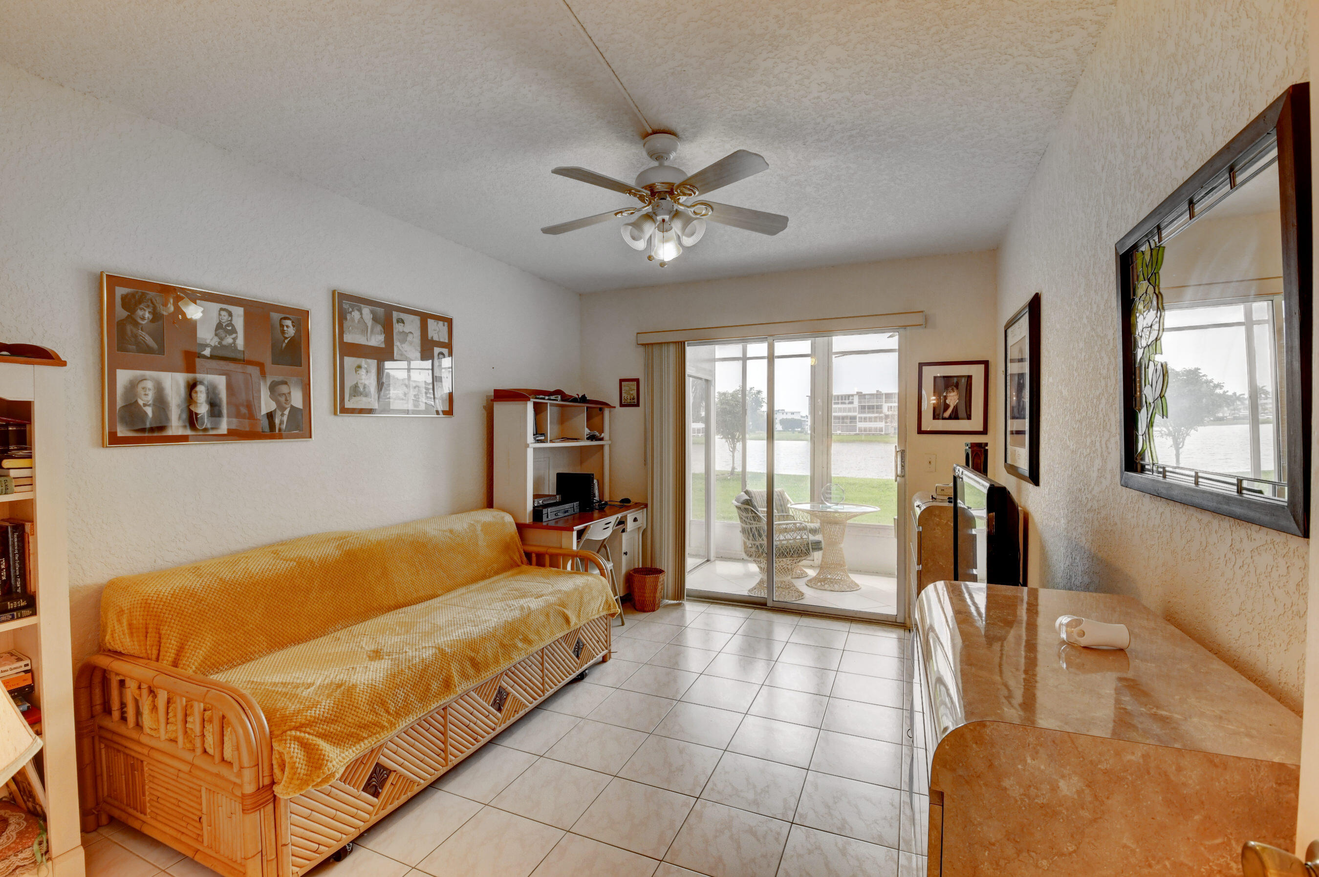 1045 Wolverton C, Unit 1045 Boca Raton, FL 33434 - Photo 26 of 67 a room with pool table and glass windows