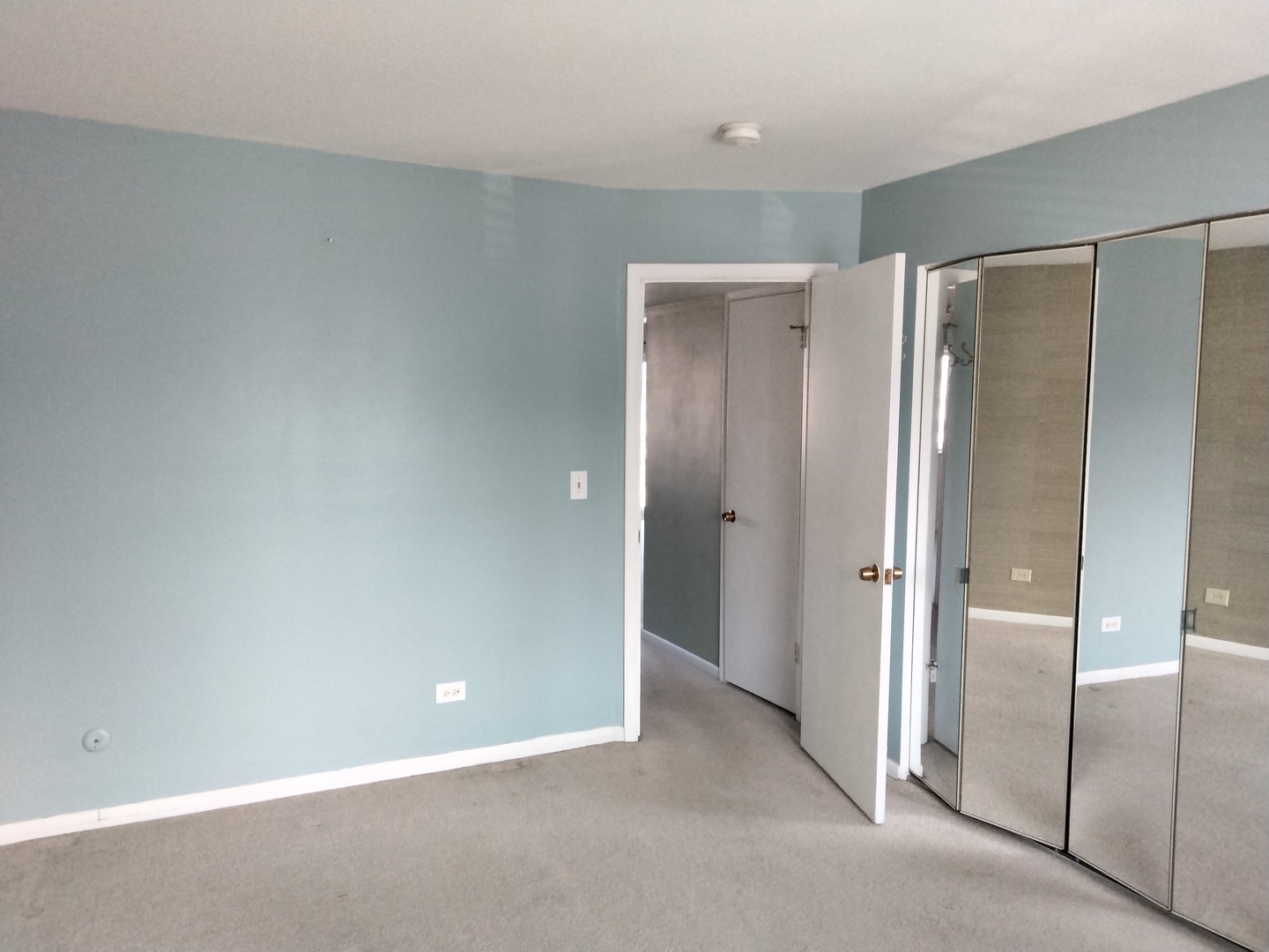 896 South Plum Grove Road, Unit 217 Palatine, IL 60067 - Photo 11 of 15 a view of an empty room