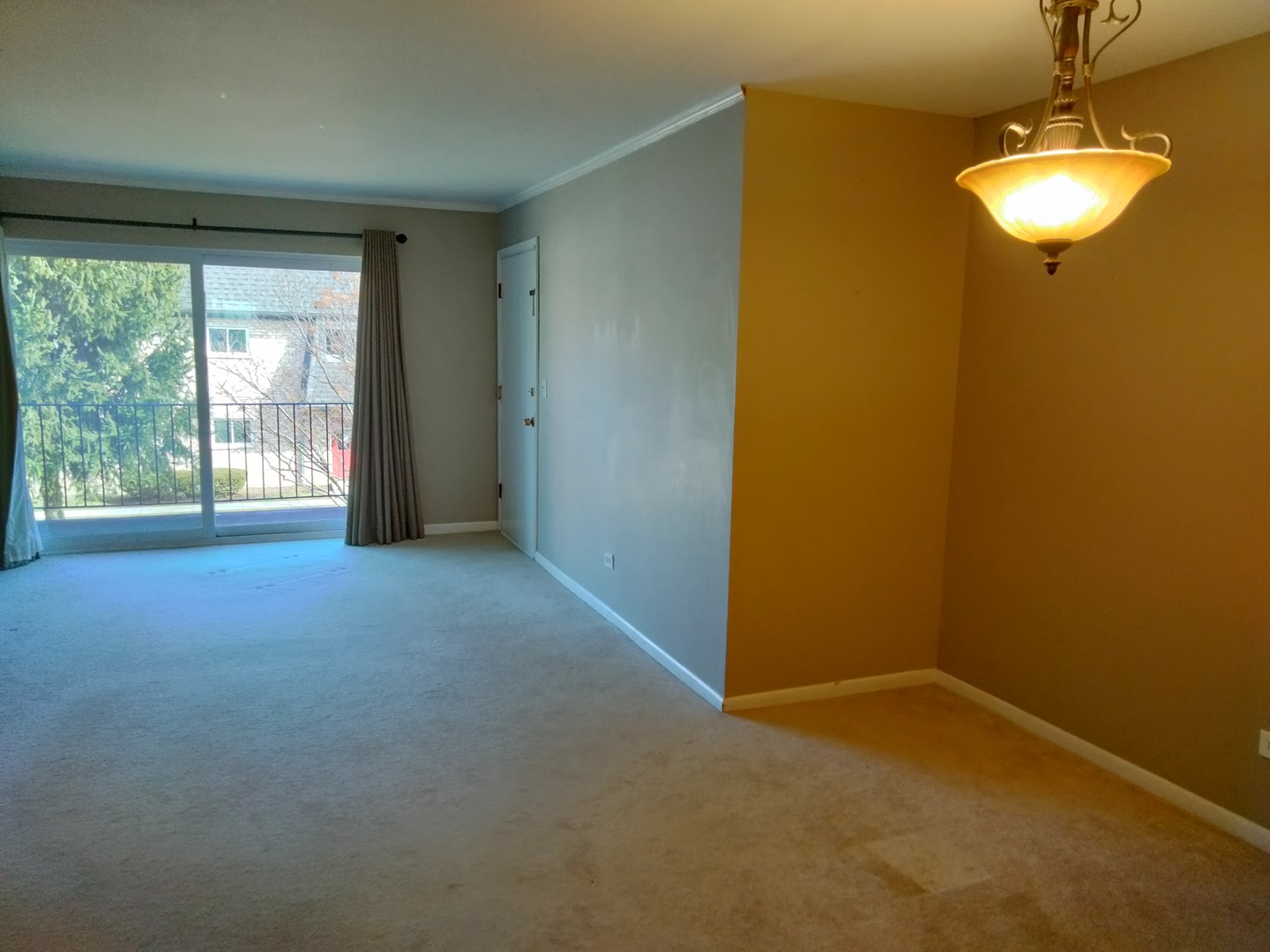 896 South Plum Grove Road, Unit 217 Palatine, IL 60067 - Photo 9 of 15 a view of empty room with a window