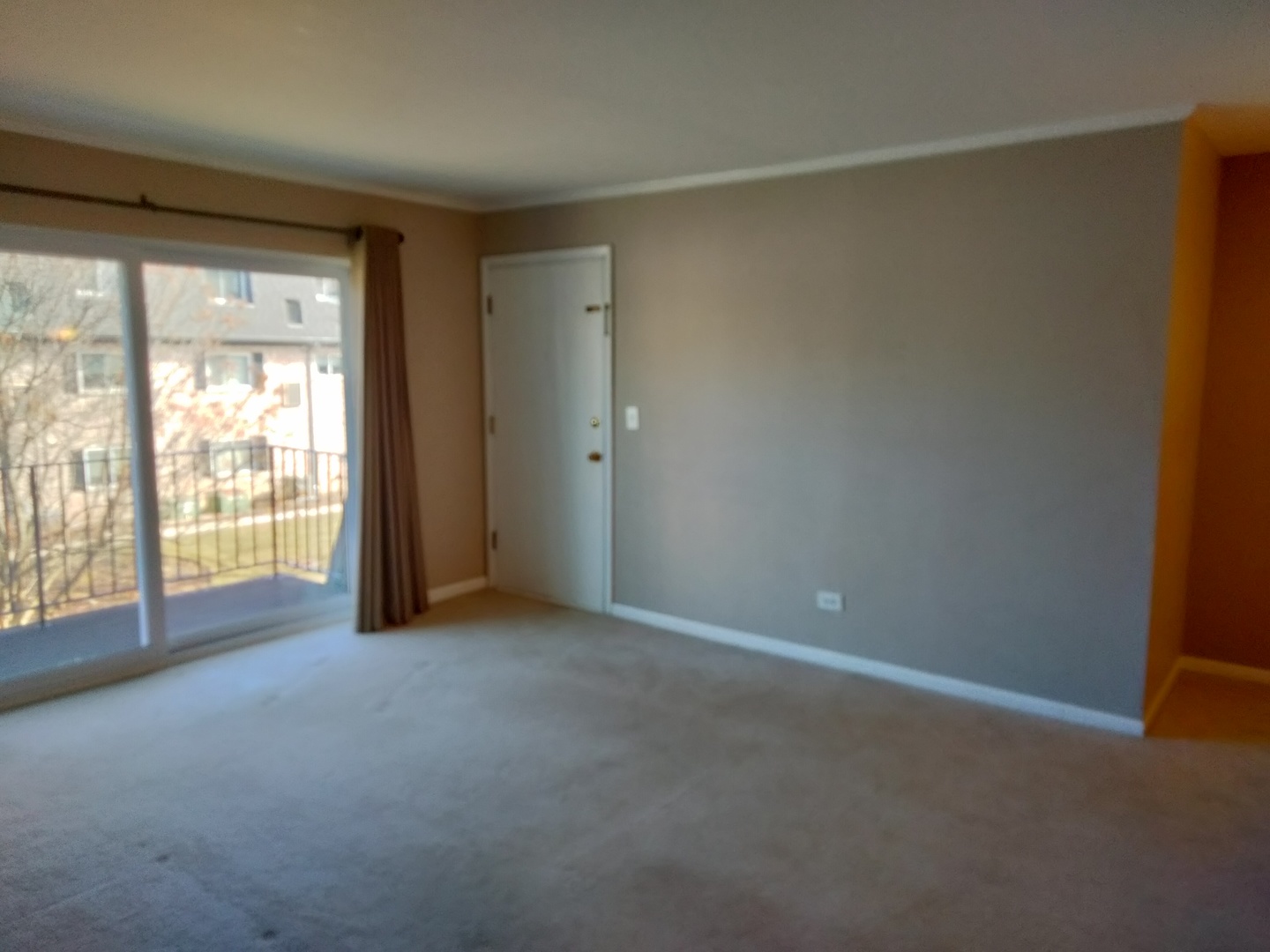 896 South Plum Grove Road, Unit 217 Palatine, IL 60067 - Photo 10 of 15 an empty room with windows