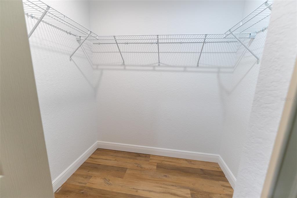 10 Cypress Loop Ocala, FL 34472 - Photo 38 of 65 a view of a room with racks on the wall