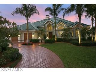 333 Devils Bight Naples, FL 34103 - Photo 1 of 8 a view of a house with a swimming pool