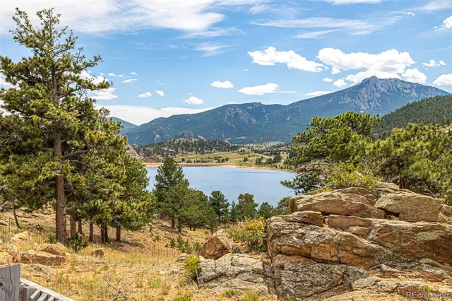 a view of lake with mountain