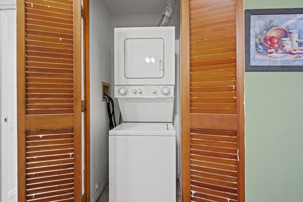 45 Christopher Drive, Unit 101 Methuen, MA 01844 - Photo 17 of 32 a utility room with dryer and washer