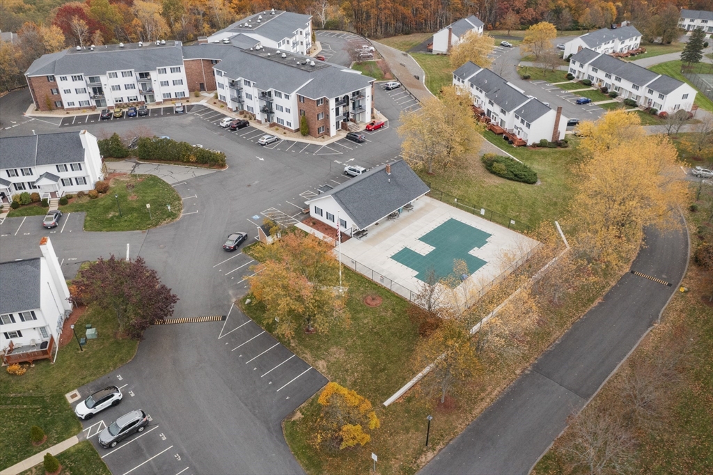 45 Christopher Drive, Unit 101 Methuen, MA 01844 - Photo 24 of 32 an aerial view of residential houses with outdoor space