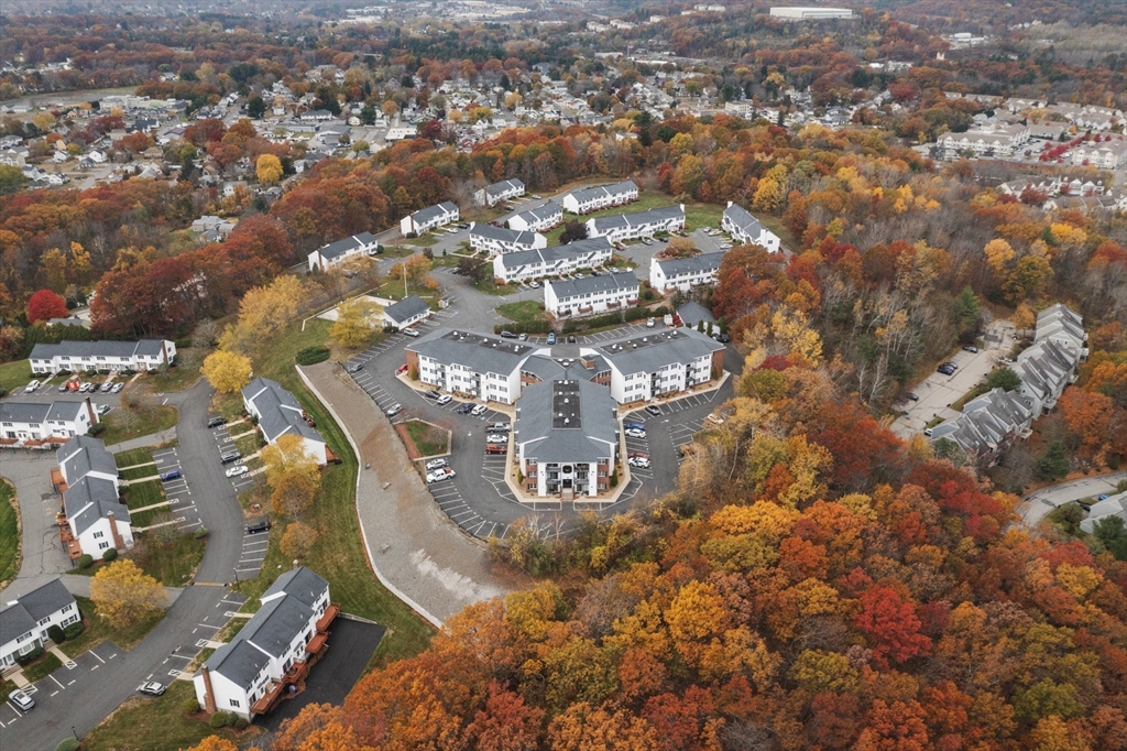 45 Christopher Drive, Unit 101 Methuen, MA 01844 - Photo 25 of 32 an aerial view of residential houses with yard