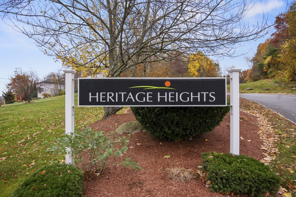 45 Christopher Drive, Unit 101 Methuen, MA 01844 - Photo 32 of 32 a sign broad on the side of the road