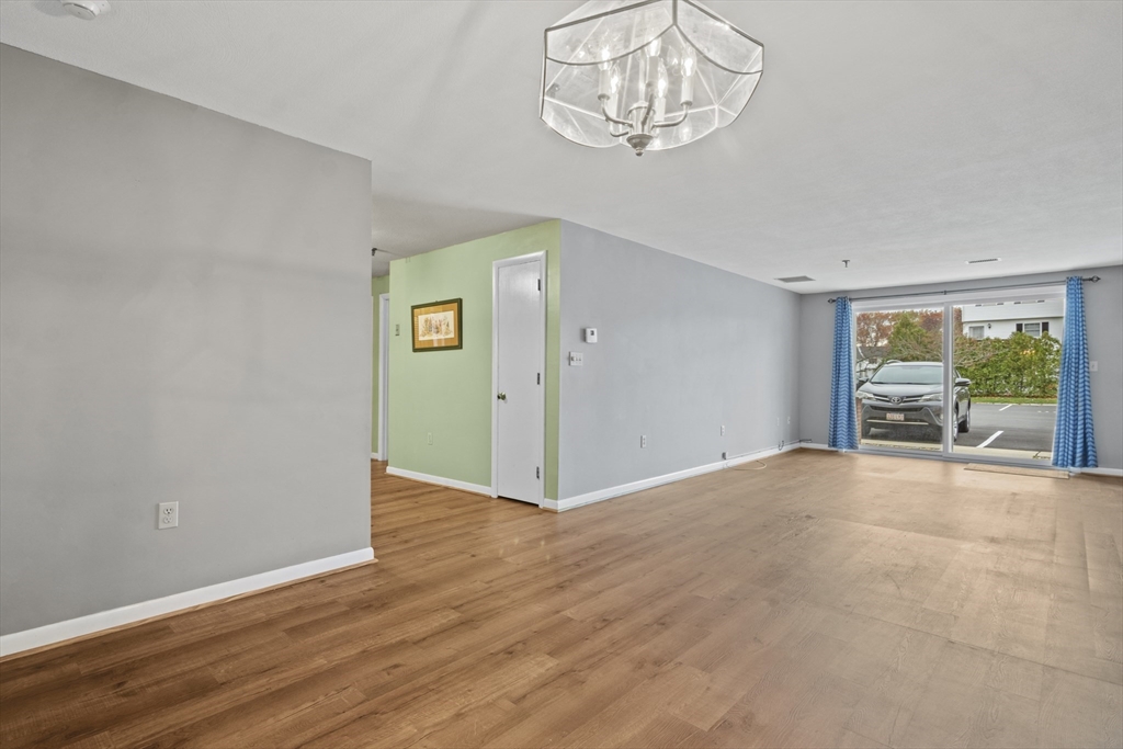 45 Christopher Drive, Unit 101 Methuen, MA 01844 - Photo 5 of 32 a view of an empty room with a window