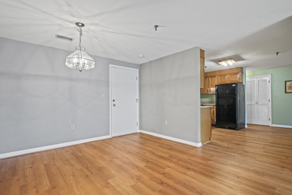 45 Christopher Drive, Unit 101 Methuen, MA 01844 - Photo 6 of 32 a very nice looking room with wooden floor and windows