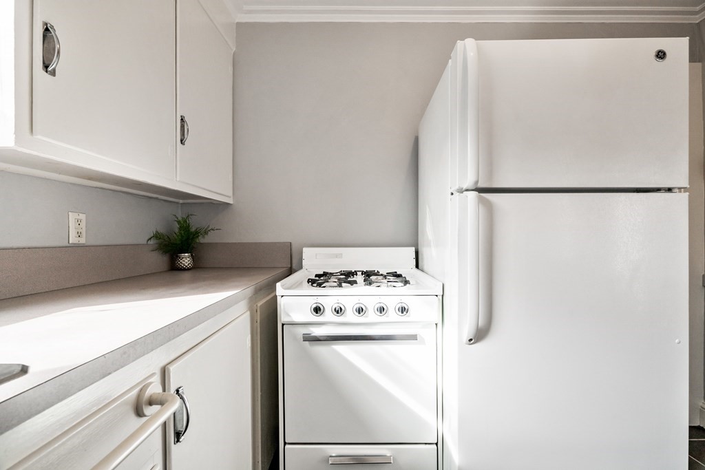 32 Magoun Street, Unit 2 Cambridge, MA 02140 - Photo 9 of 13 a utility room with dryer and washer