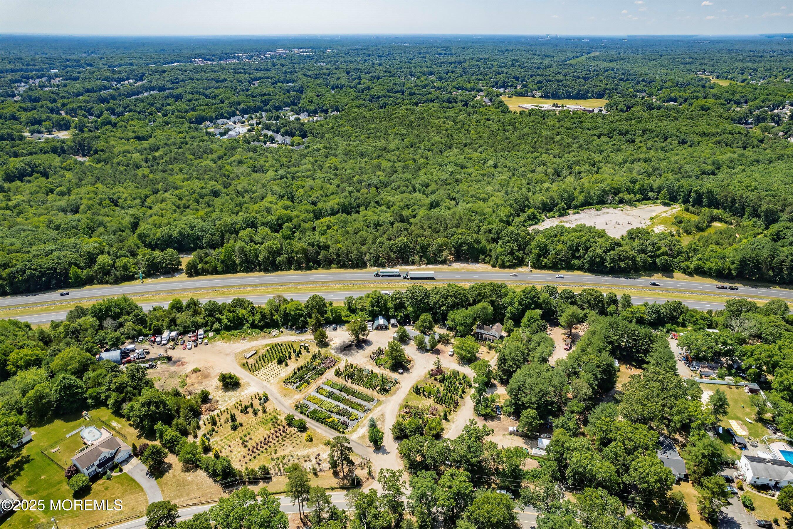 763 Hulses Corner Road Howell, NJ 07731 - Photo 11 of 34 a view of a bunch of trees and houses