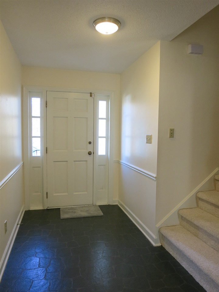 5809 Old Forge Circle Raleigh, NC 27609 - Photo 2 of 25 Updated w/NEW windows 2012, NEW light fixtures & NEW carpet. Welcoming Foyer w/NEW light fixture, chair rail molding & coat closet. Foyer