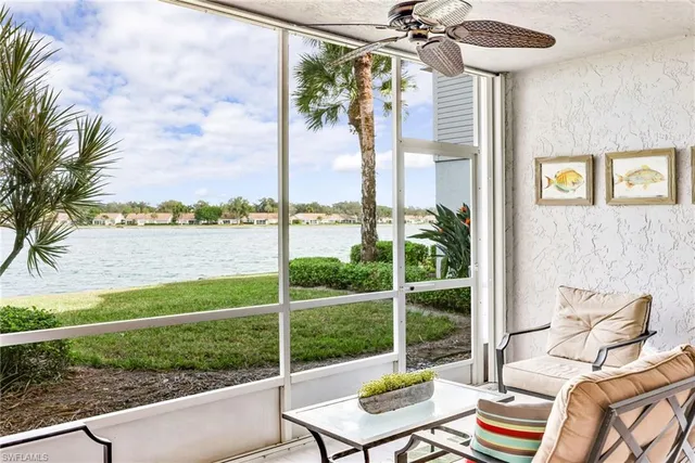 a view of a patio with a table chairs and a table
