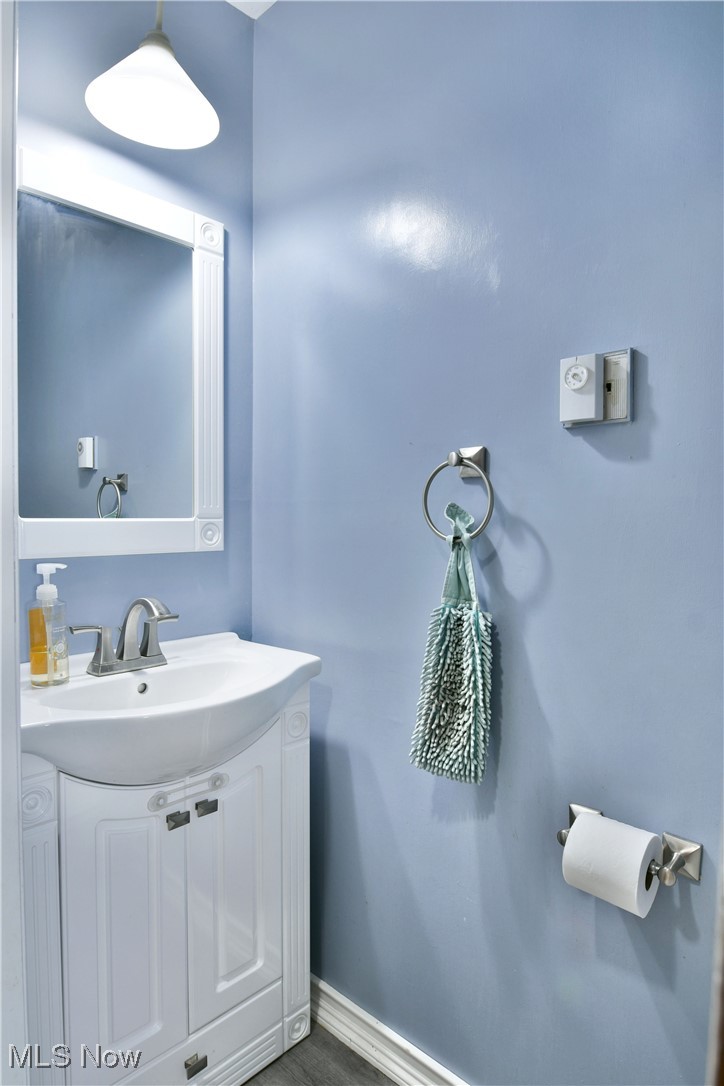 5531 Phillips Rice Road Cortland, OH 44410 - Photo 13 of 50 Bathroom with vanity and baseboards