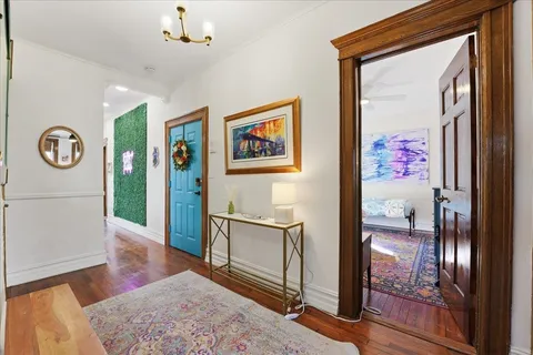 a view of a hallway with painted walls