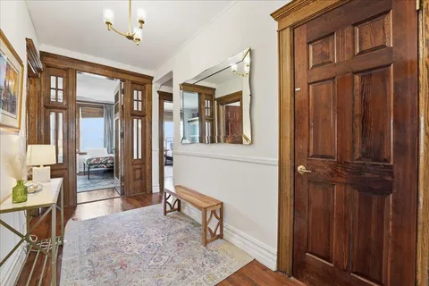 a view of a livingroom with furniture and windows