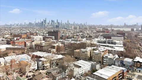 a large building with a city view
