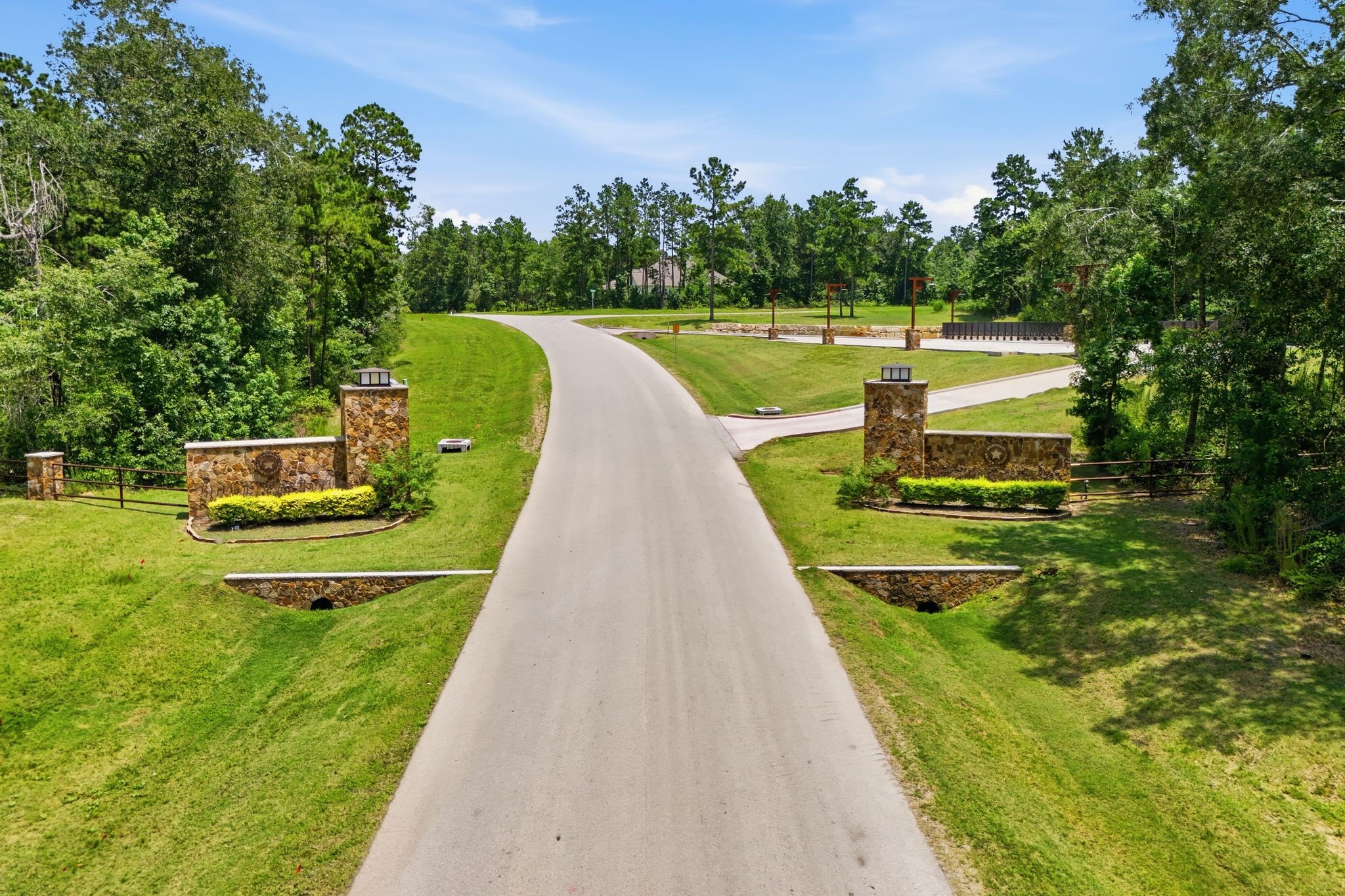 16222 Ridge Oak Road Willis, TX 77378 - Photo 28 of 32 Aerial view of Republic Grand Ranch South entrance