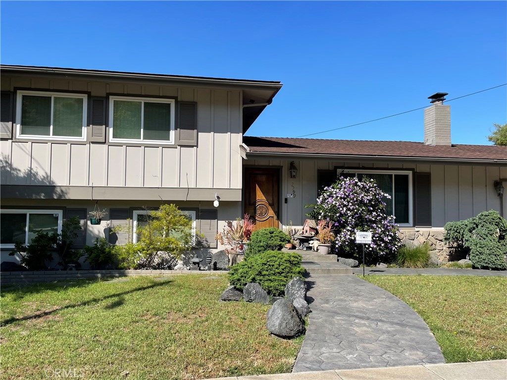 2299 Flora Street San Luis Obispo, CA 93401 - Photo 1 of 19 a front view of a house with garden