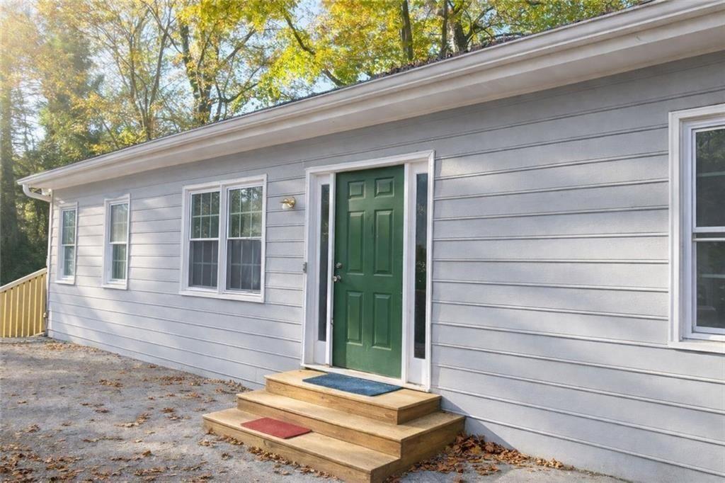1637 Roman Point Drive Norcross, GA 30093 - Photo 1 of 9 a backyard of a house