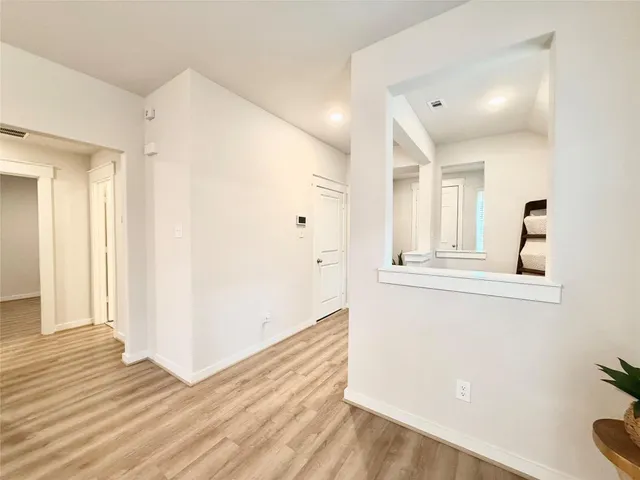 a bathroom with a granite countertop sink mirror and double