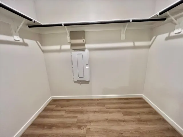 a view of a room with racks on the wall