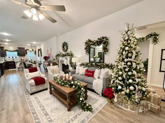 a kitchen with stainless steel appliances kitchen island granite countertop a refrigerator a stove a sink dishwasher with a dining table and chairs