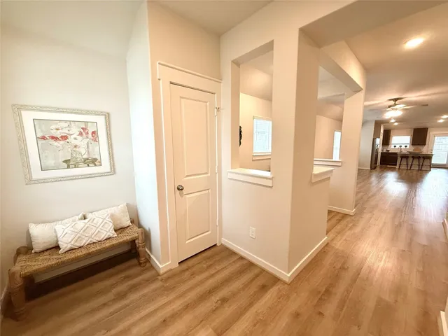 a view of a livingroom with furniture and wooden floor