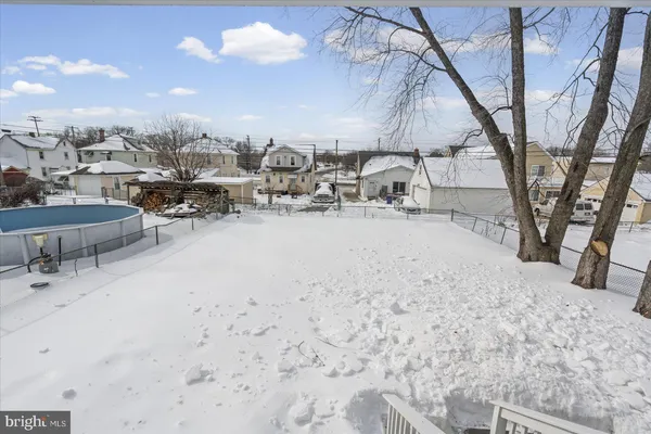 a view of a backyard of a house