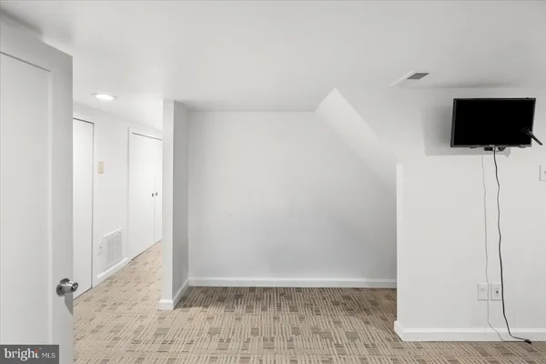 a view of a livingroom with wooden floor