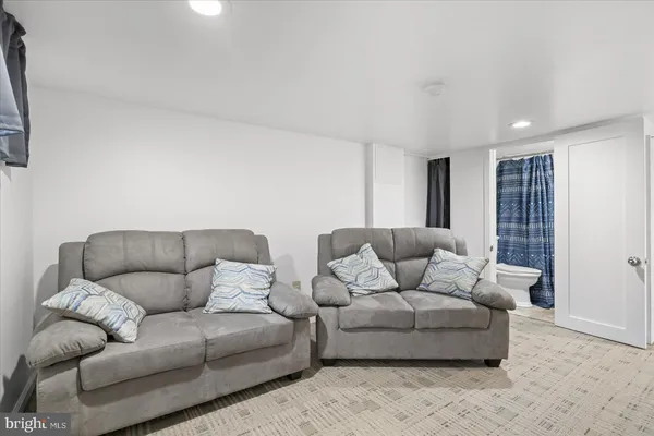 a living room with furniture and a couch