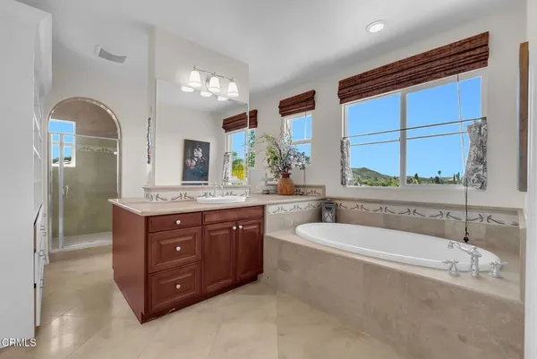 a bathroom with a sink a toilet and a bathtub